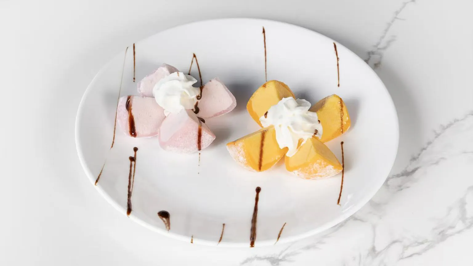 Sweet strawberry & mango mochi with cream at Izumi Sushi, a Japanese Restaurant in Littleton