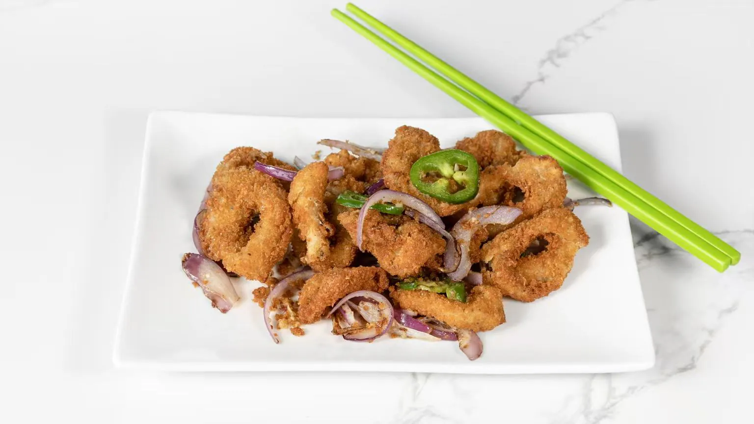Crispy calamari rings with onions & peppers at Izumi Sushi, a Japanese Restaurant in Littleton